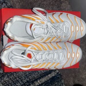 Nike Air Max Plus EMEA red, white, and orange